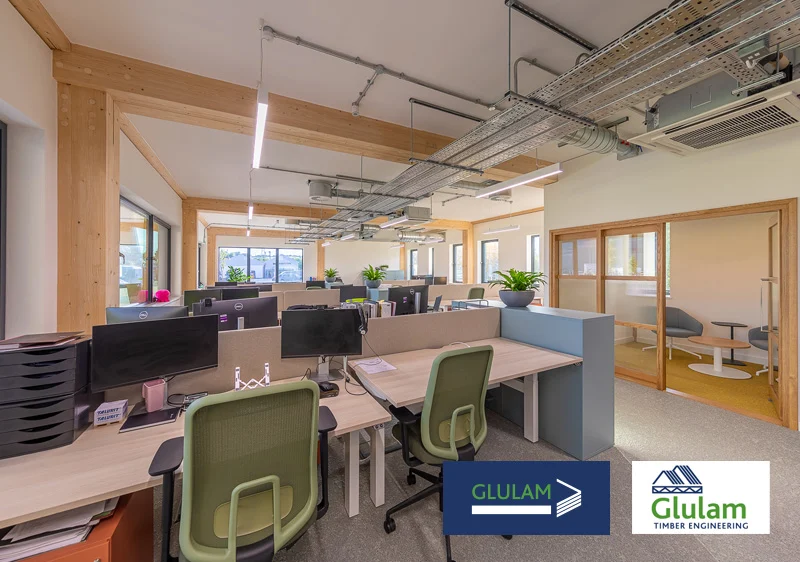 office room with desks and seating areas