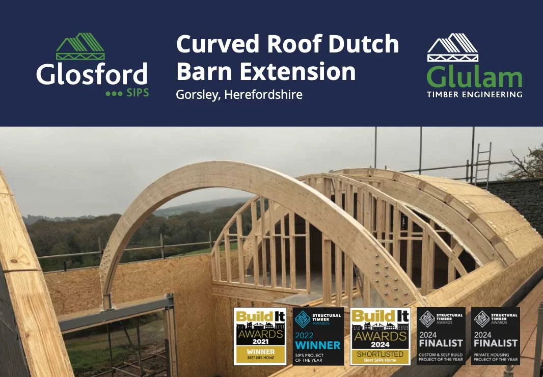 Curved roof structure on building site