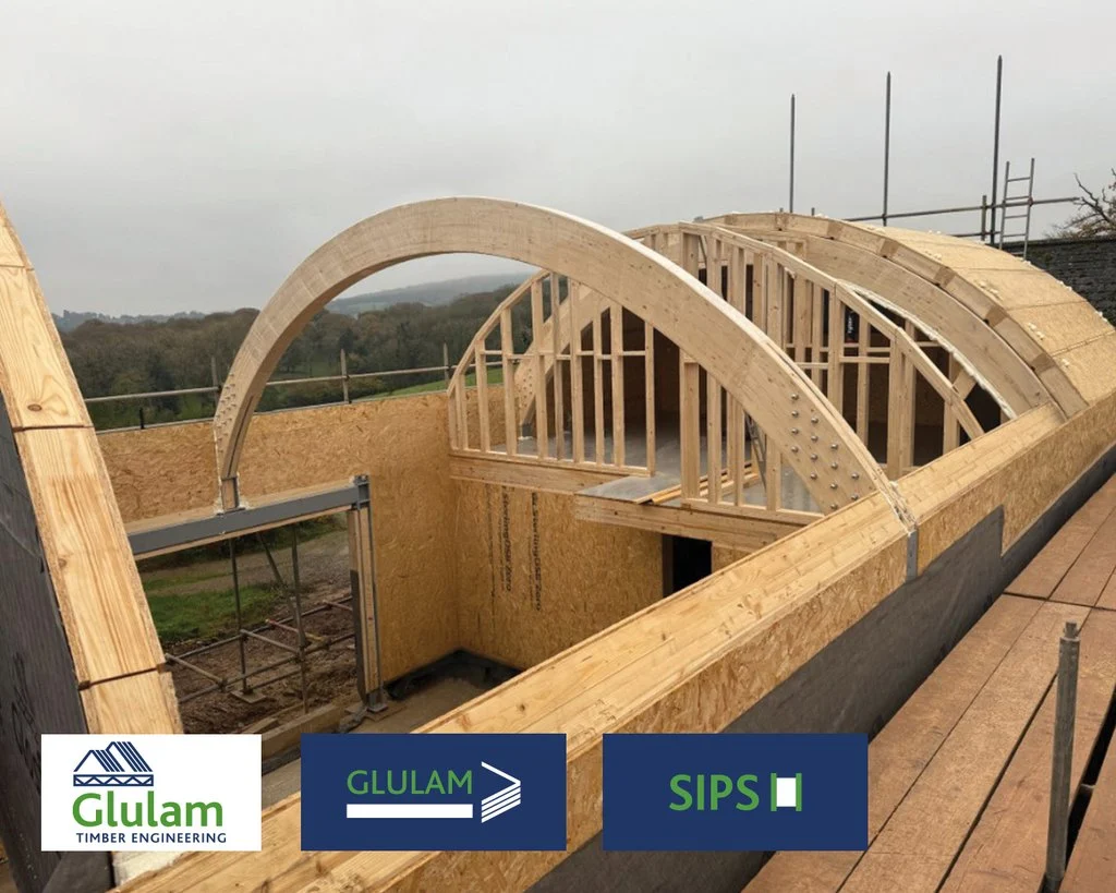 Curved glulam and sips panels in a dutch barn extension