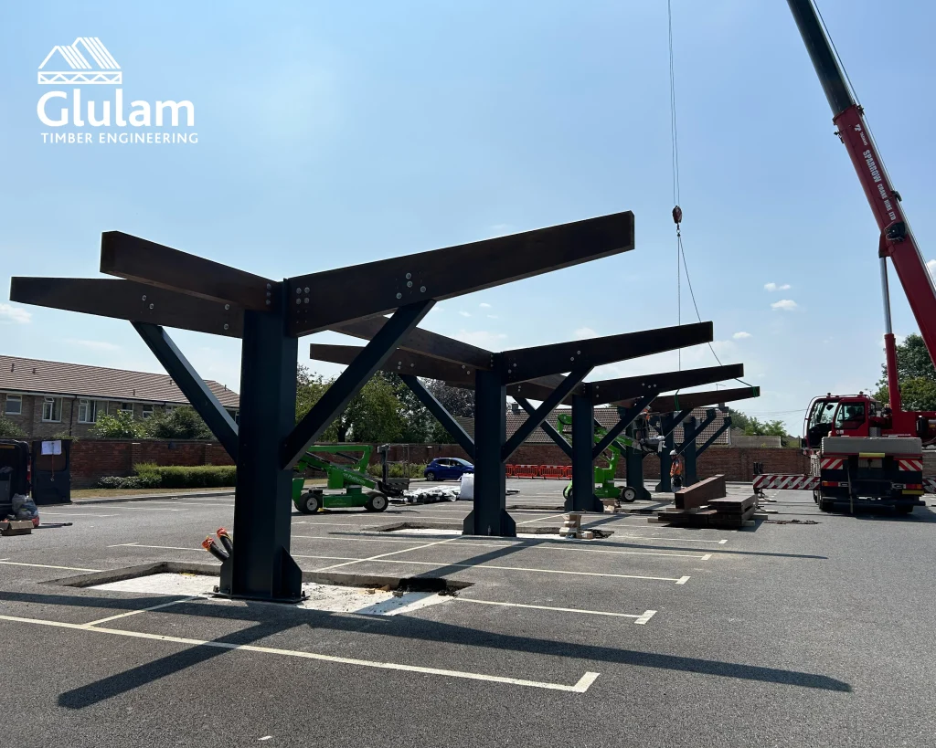 Wooden shelter structure in a car park