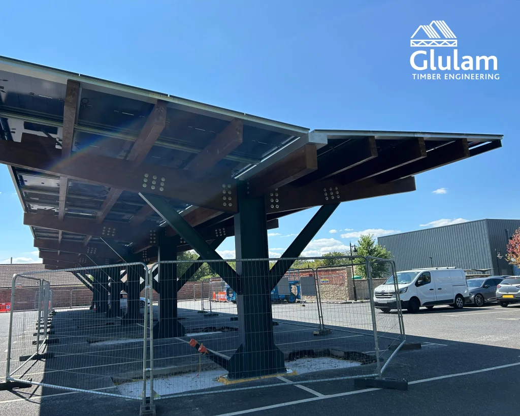 Wooden shelter structure in a car park