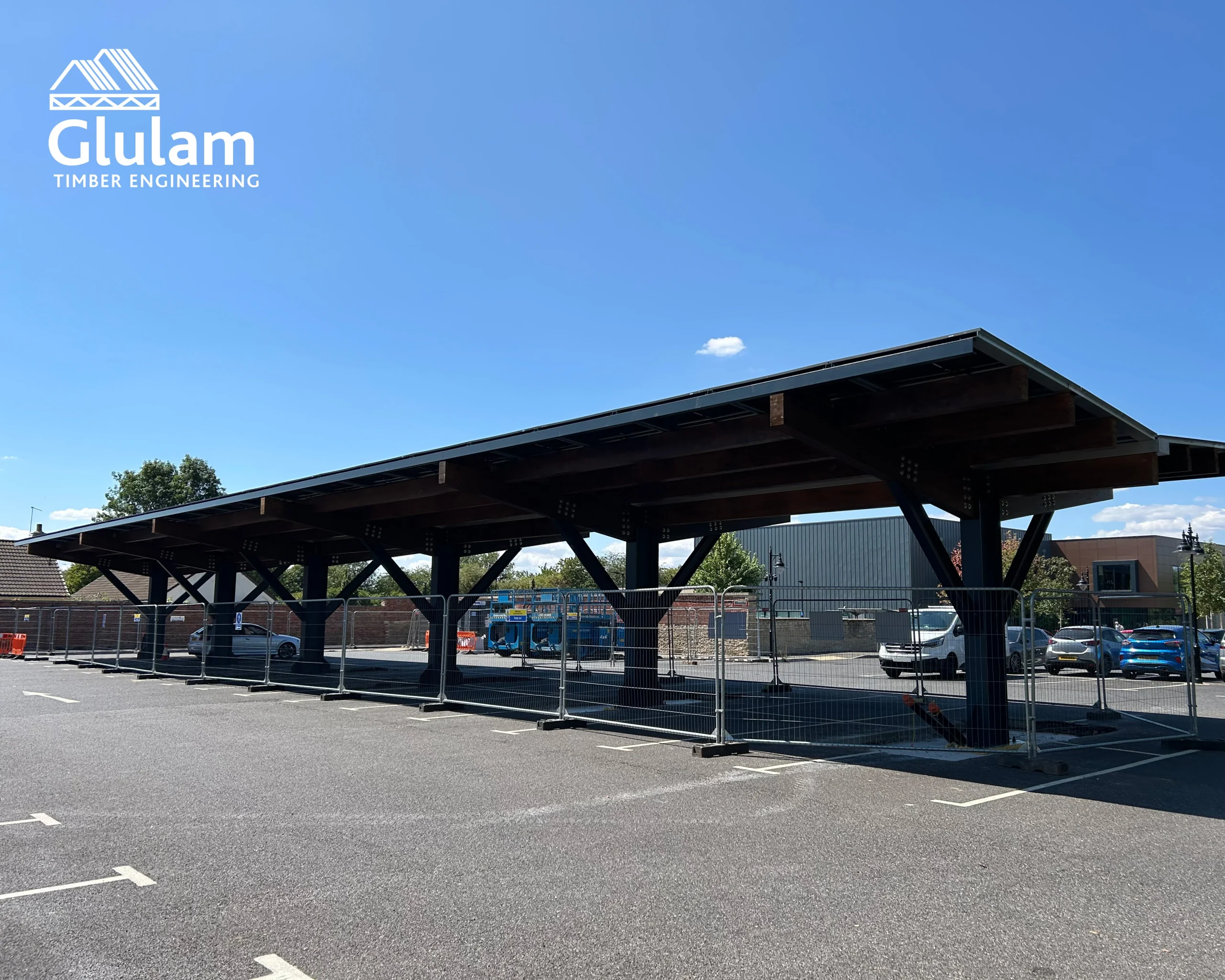 Wooden shelter structure in a car park